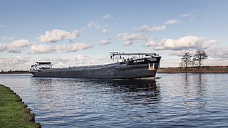 Motor storage vessel Janneke, EU number 02322435 Front and starboard side.