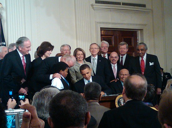 President Obama signing the Patient Protection and Affordable Care Act into law, March 23, 2010.