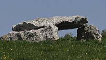 Pen Rhiw Cromlech: a broad, low-lying cromlech in a field north of Pen-rhiw farm, Goodwick. Pen Rhiw Cromlech, Goodwick, Pembrokeshire.jpg