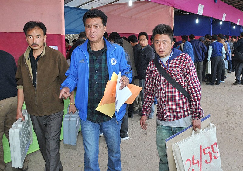 File:Polling officials carrying Electronic Voting Machines (EVM) and other election materials for the General Elections-2014, at the distribution centre, at Kurseong, Darjeeling constituency on April 16, 2014.jpg