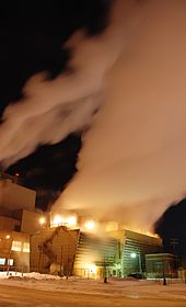 City power plant at night blows steam into the air Power plant in Ames.jpg