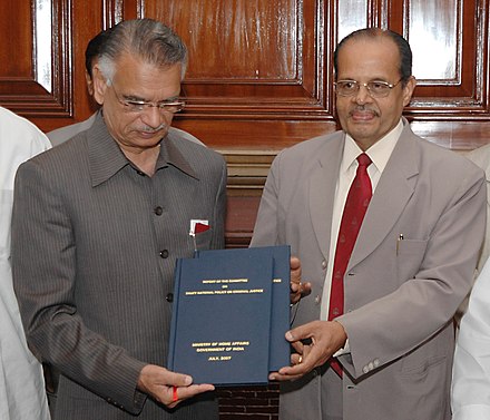 N.R Madhava Menon presenting report of the committee on draft National Policy on Criminal Justice to the 25th Home Minister of India Shivraj Patil in New Delhi 2007.
