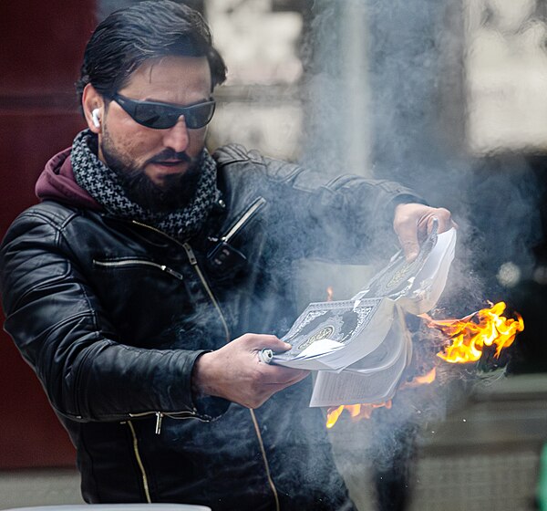 Salwan Momika burning a Quran in October 2023