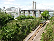 Passing under the Royal Albert and Tamar bridges at St Budeaux Royal Albert Bridge 153382.jpg