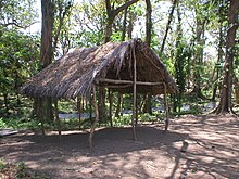 An earthfast shelter. The posts are buried in the ground so no bracing is necessary. Shelter by presa (closer).jpg