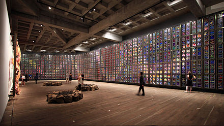 Sidney Nolan's Snake mural (1970), held at the Museum of Old and New Art in Hobart, Tasmania, is inspired by the Aboriginal creation myth of the Rainbow Serpent, as well as desert flowers in bloom after a drought.[357]