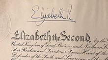 Letters patent bearing the title of Queen Elizabeth II of the United Kingdom below her royal sign-manual Signature of queen Elizabeth II in Adligat.jpg