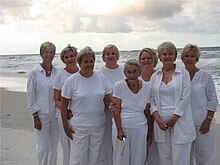 This picture is of the seven sisters who created the Sisters Family Cookbook and their mother on one of their Sister Gatherings.