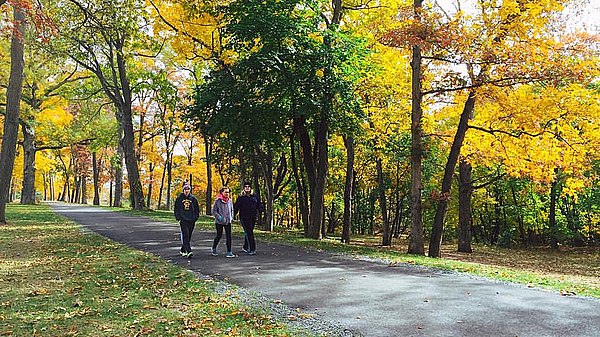 Residents walking in Skillman Park