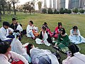 Some students in Hanfu having a picnic