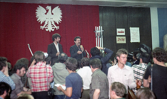 Strike committee at the Lenin Shipyard, August 1980. On stage are Bogdan Lis (left) and Lech Wałęsa (right).