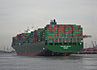 The new container vessel Thalassa Hellas approaches the Port of Hamburg - rear view