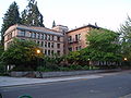 Side view of Fenton Hall, on the University of Oregon campus in Eugene, Oregon. The portion on the right hand side (with many windows) was added to the building after completion, and still houses University Archives.