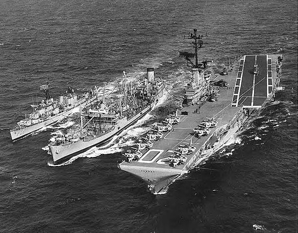 Mispillion (middle) a T3-S2-A3 tanker, fueling USS Bennington and USS Alfred A. Cunningham in 1963