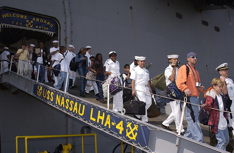 File:US Navy 030529-N-1522S-008 Sailors and family members depart the amphibious assault ship USS Nassau (LHA 4).jpg