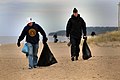 US Navy 100505-N-9917S-013 Sailors assigned to the guided-missile cruiser USS Vicksburg (CG 69) and the Lithuanian navy clean the Melrange Municipality beach in Klaipeda, Lithuania.jpg