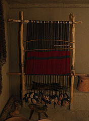Reconstruction of a vertical neolithic loom with shed bar without string heddles, on display at Piatra Neamț Museum