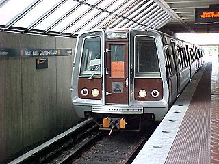 An Orange Line train at West Falls Church station in 2001