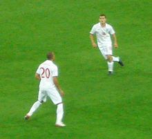 Zamora (left) making his England debut in 2010 WilshereZamoraEngland.png