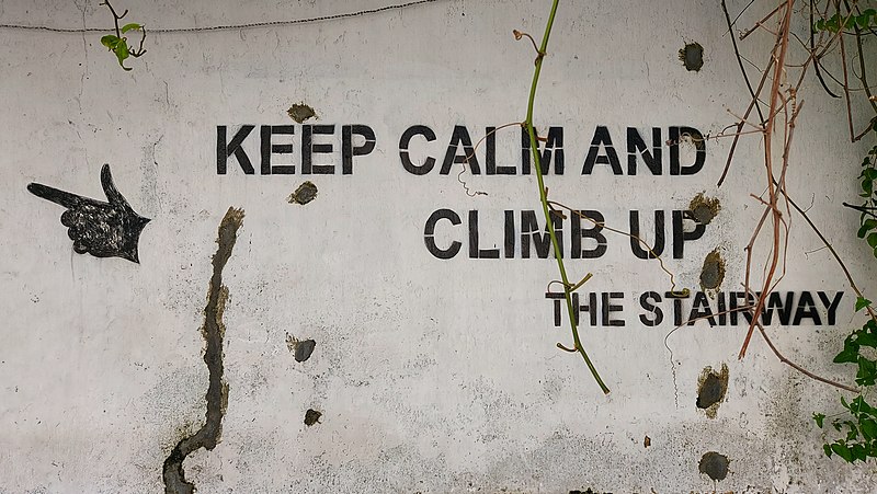 File:"Keep calm and climb up the stairway" sign, Galle, Sri Lanka.jpg