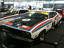 Ford XC Falcon Hardtop Group C race car - Moffat/Ickx 1977 Hardie Ferodo 1000 race winning car (second-placed team car of Bond/Hamilton in the background) 1977 Ford XC Falcon Hardtop Group C - Outright Winner 1977 Hardie Ferodo 1000 (5209378189).jpg