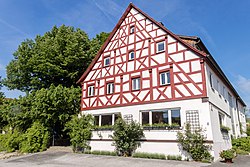 Timber-framed inn and a protected linden tree in Kersbach