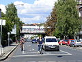 A street with softly separated cycle lanes, nevertheless implicating special duties and rights for motorists and cyclists