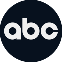 The white lowercase "abc" letters in a black circle.