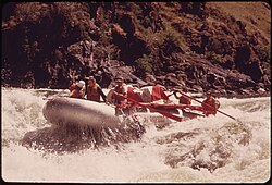 Rafting in Hells Canyon (1973) by Boyd Norton A LARGE (28 FOOT) RAFT RUNNING WILD SHEEP RAPIDS ON THE SNAKE RIVER DURING A CONSERVATION TRIP THROUGH HELLS CANYON - NARA - 549462.jpg