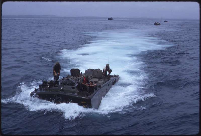 File:Amtracs coming into the LPD during training exercises involving the 1st Amphibious Tractor Battalion. - NARA - 532457.tif