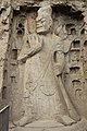 Ancient Buddhist Grottoes at Longmen- Middle Binyang Cave, Celestial Guardian Statue.jpg