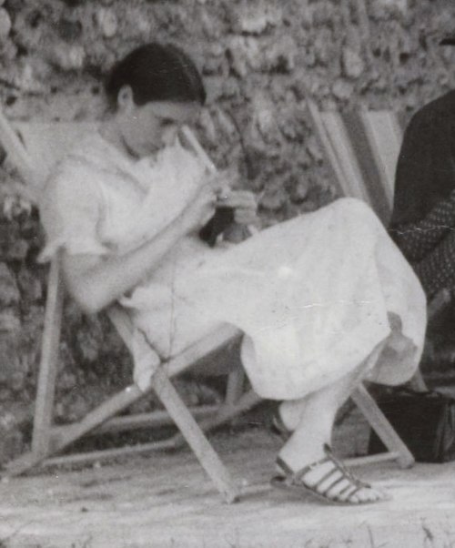 Photo of Angelica Garnett sitting outside. Picture from Virginia Woolf Monk's House photograph album.