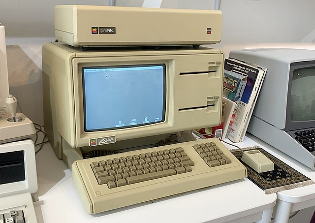 An Apple Lisa (1983) demonstrating the Lisa Office System (LisaOS), which featured Apple Computer's first commercially available GUI