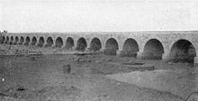 Eighteen Arch Ashlar Bridge at Asluj Asluj arch bridge in 1917.jpg