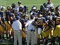 Cal in a huddle during a home game against the Colorado Buffaloes. The Golden Bears won 52-7.