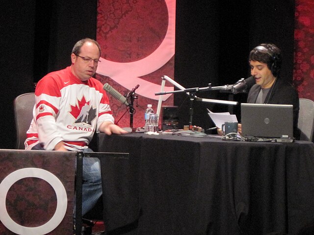 Ghomeshi interviewing Brent Butt on Q in 2010.