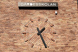 Brick Wall clock, Markeskolen, Marken district Stockholm.jpg