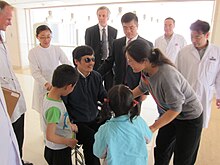 Chen Guangcheng with his family at a hospital in Beijing, China, on May 2, 2012 Chen Guangcheng in hospital.jpg