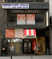 Exterior of 47 Broadway in December 2021, with China Chalet signage still visible China Chalet Exterior.png