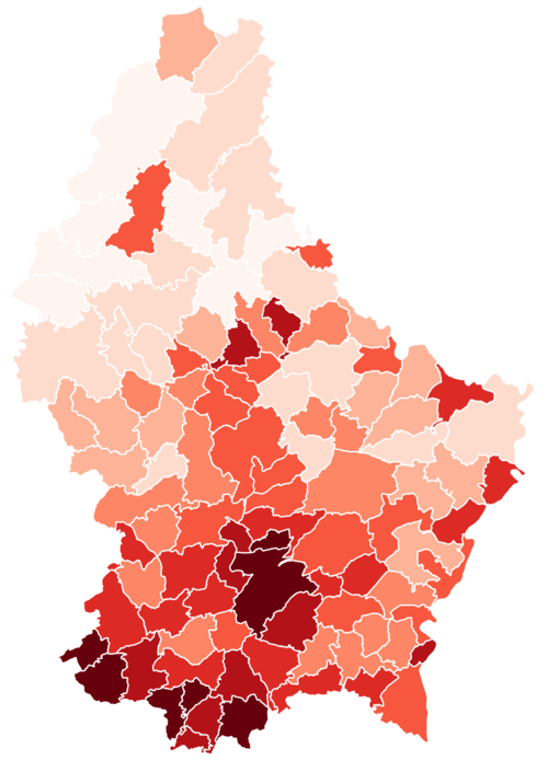 Map of communes shaded by population density. Greater population density is reflected by darker shades of red. Communes of Luxembourg Density.PNG