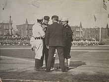 Conference on the field during a 1905 World Series game at Columbia Park. During this meeting, the Philadelphia captain would hand a "White Elephant" model to McGraw as a funny gift. Conference on the field at the Columbia Avenue Grounds, 1905 World Series.jpg