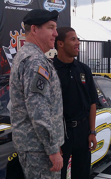 Wallace with a member of the U.S. Army, the sponsor of his East Series car in 2011, at Richmond that year.