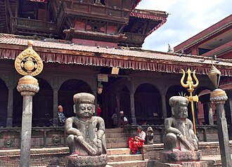 The shankha on the right is the icon for Vishnu at the Dattatreya temple, Bhaktapur Nepal Dattatreya temple Bhaktapur Nepal.jpg