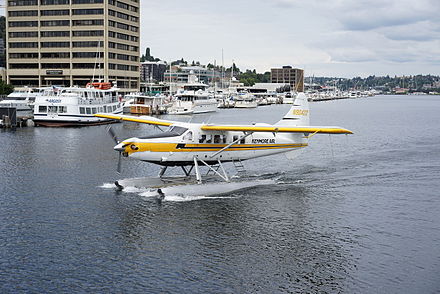 Kenmore Air floatplane arriving at a terminal on Lake Union