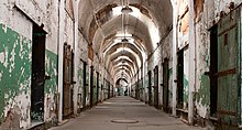 The music video was partially filmed at Eastern State Penitentiary, an abandoned prison seen here in 2009. Esp-hallway-seeminglee.jpg