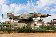 An F-4E Phantom II Kur­nass of several squadrons (see tail and nose) at Giv'at Olga Technoda