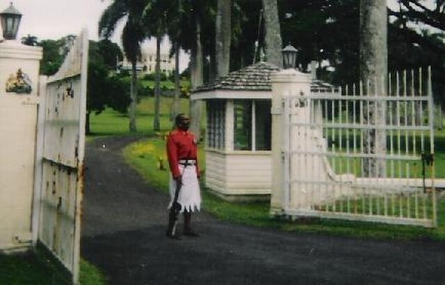 Guard outside the presidential palace in Suva, 2003