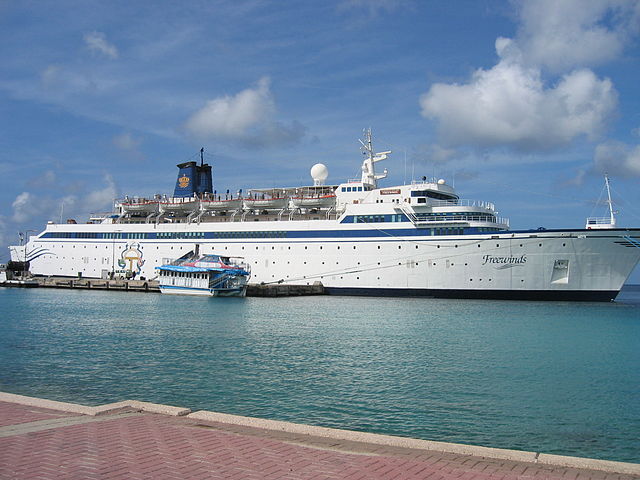 The Scientology organization's cruise ship, the Freewinds, staffed by Sea Org members, with OT symbol on side of ship