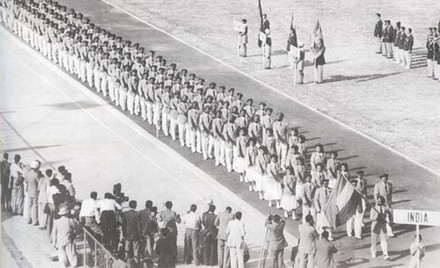 Indian athletes marching into the National Stadium during the opening ceremony of the 1951 Asian Games.