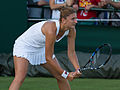 Irina-Camelia Begu competing in the first round of the 2015 Wimbledon Championships.